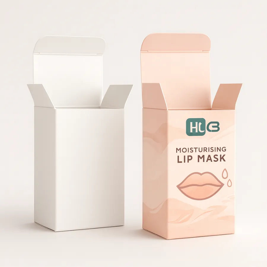 Two upright tuck-end boxes- one plain white and one with peach branded graphics- class=